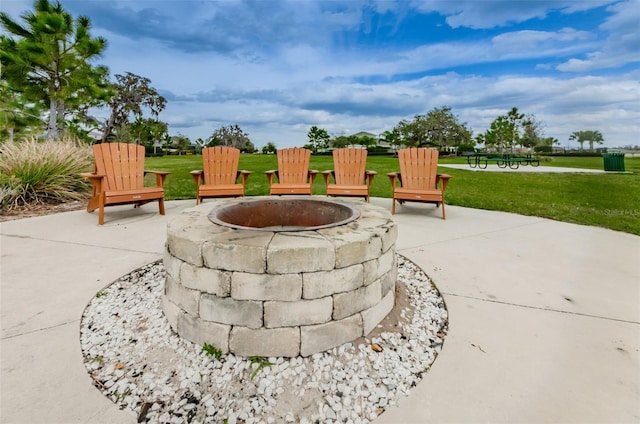 14008 Lugano Ct, Hudson, FL 34669 - view of patio / terrace featuring a fire pit