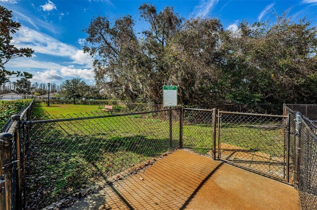 14008 Lugano Ct, Hudson, FL 34669 - view of patio with a gate