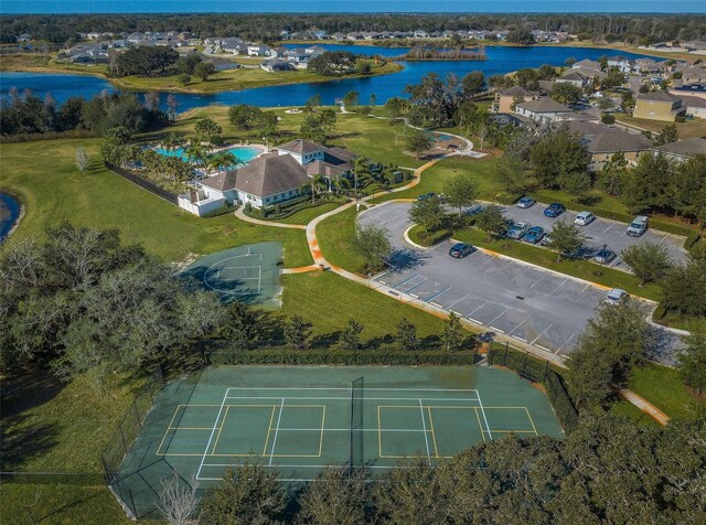 14008 Lugano Ct, Hudson, FL 34669 - aerial overview of property's location featuring a nearby body of water and a pool area
