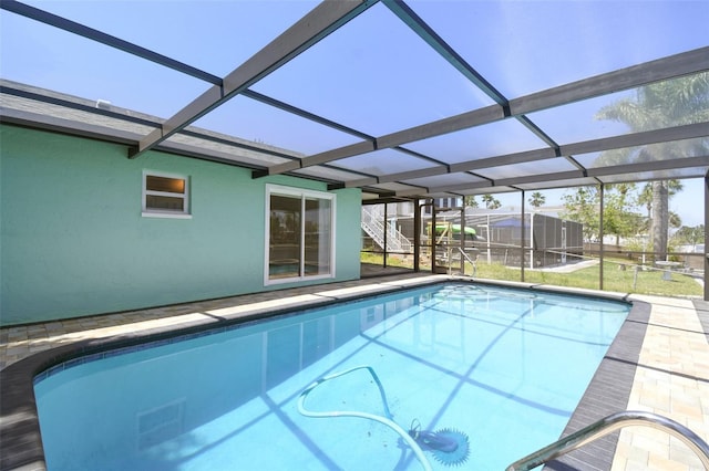 4482 Kingston Dr, Hernando Beach, FL 34607 - swimming pool featuring glass enclosure
