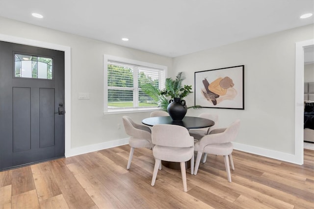 18102 Spencer Rd, Odessa, FL 33556 - dining room featuring light wood-type flooring, baseboards, healthy amount of natural light, and recessed lighting