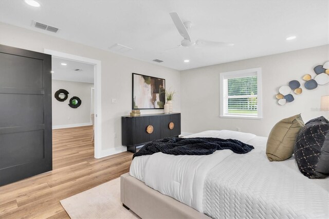 18102 Spencer Rd, Odessa, FL 33556 - bedroom with wood finished floors, recessed lighting, ceiling fan, and baseboards
