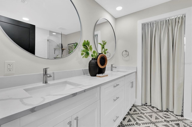 18102 Spencer Rd, Odessa, FL 33556 - full bath featuring double vanity, a shower, and recessed lighting