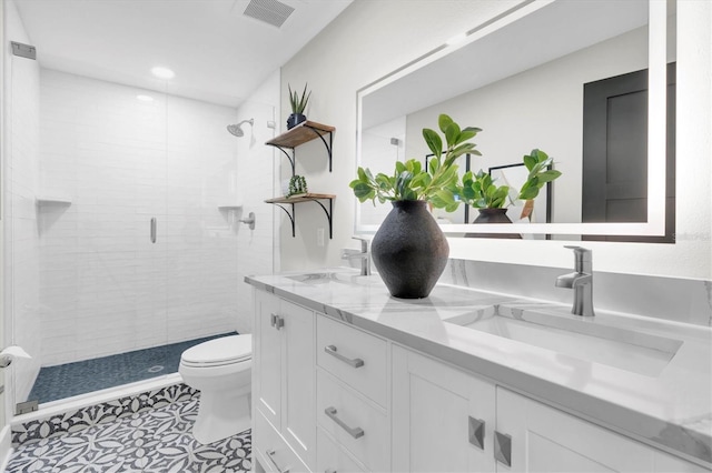 18102 Spencer Rd, Odessa, FL 33556 - bathroom featuring a shower stall, toilet, double vanity, recessed lighting, and tile patterned floors