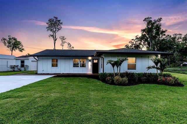 18102 Spencer Rd, Odessa, FL 33556 - single story home featuring board and batten siding and a yard