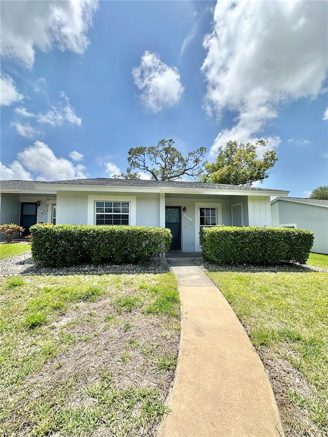 12511 Dearborn Dr, Hudson, FL 34667 - single story home with a front yard and stucco siding