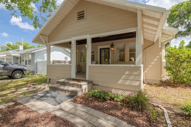 6207 Main St, New Port Richey, FL 34653 - view of front facade featuring covered porch