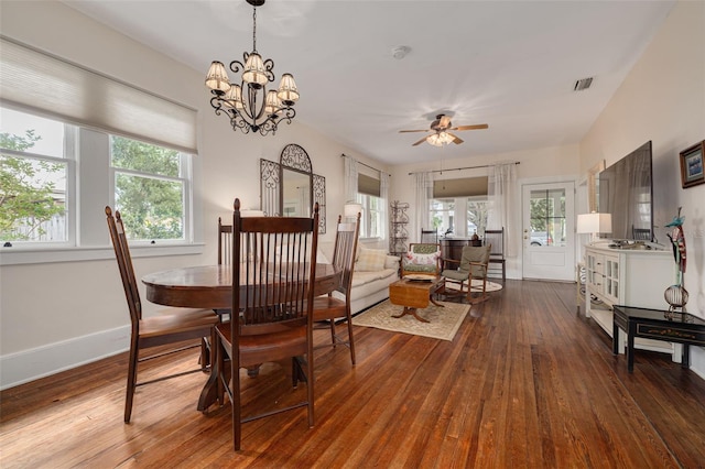 6207 Main St, New Port Richey, FL 34653 - dining room featuring hardwood / wood-style floors, a ceiling fan, and baseboards