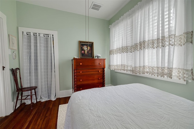 6207 Main St, New Port Richey, FL 34653 - bedroom with wood finished floors and baseboards