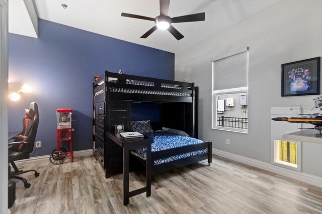 16697 Courtyard Loop, Land O Lakes, FL 34638 - bedroom featuring wood finished floors and a ceiling fan