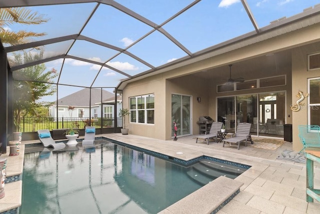 16697 Courtyard Loop, Land O Lakes, FL 34638 - view of swimming pool featuring a patio area, ceiling fan, and a lanai