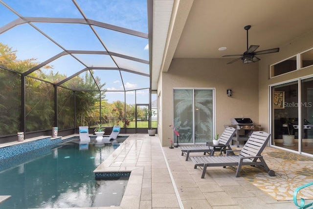 16697 Courtyard Loop, Land O Lakes, FL 34638 - view of pool featuring area for grilling, a patio area, and a ceiling fan