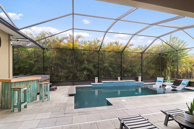 16697 Courtyard Loop, Land O Lakes, FL 34638 - swimming pool featuring a patio area and glass enclosure