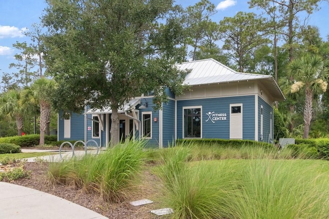 16697 Courtyard Loop, Land O Lakes, FL 34638 - view of front of property with a metal roof