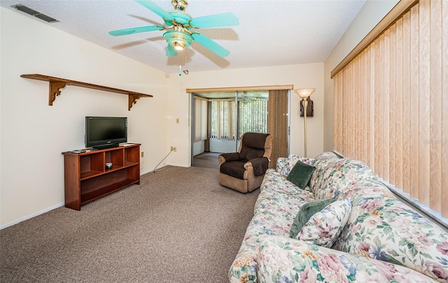 3838 Lanyard Ct Unit B, New Port Richey, FL 34652 - carpeted living area featuring ceiling fan and a textured ceiling