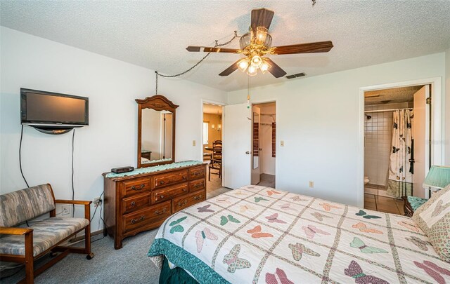 3838 Lanyard Ct Unit B, New Port Richey, FL 34652 - bedroom with a textured ceiling, carpet floors, and a ceiling fan