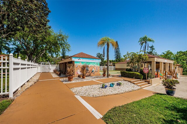 3838 Lanyard Ct Unit B, New Port Richey, FL 34652 - view of property's community with a gate