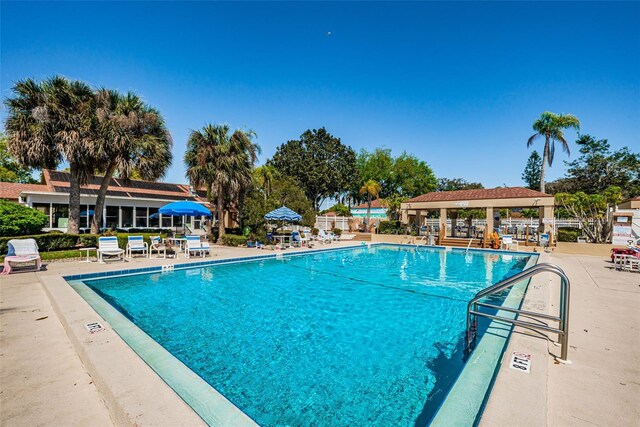 3838 Lanyard Ct Unit B, New Port Richey, FL 34652 - community pool with a gazebo and a patio