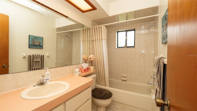 5309 Bayonne Ave, Spring Hill, FL 34608 - full bath with toilet, shower / bathtub combination with curtain, vanity, and radiator