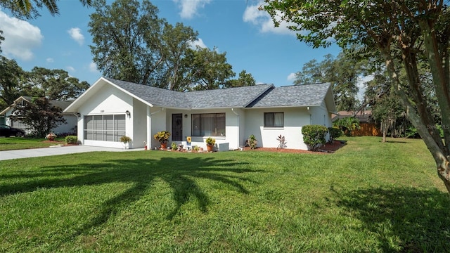 5309 Bayonne Ave, Spring Hill, FL 34608 - ranch-style home with a garage, driveway, stucco siding, and a front lawn
