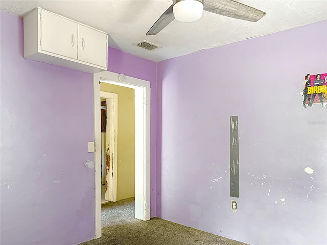 1324 SE 4th Ave, Gainesville, FL 32641 - empty room with carpet flooring and a ceiling fan
