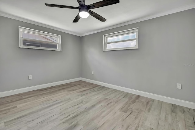 6306 Aberdeen Ave, New Port Richey, FL 34653 - spare room with ornamental molding, light wood-style floors, baseboards, and a ceiling fan