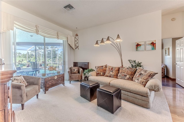 8132 Summersong Ct, Spring Hill, FL 34606 - living area featuring a sunroom and wood finished floors