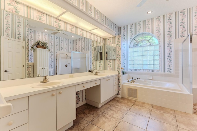 8132 Summersong Ct, Spring Hill, FL 34606 - full bath with double vanity, a stall shower, a bath, wallpapered walls, and tile patterned flooring