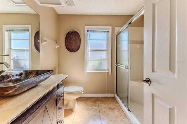 8132 Summersong Ct, Spring Hill, FL 34606 - full bath with vanity, tiled shower, toilet, and healthy amount of natural light