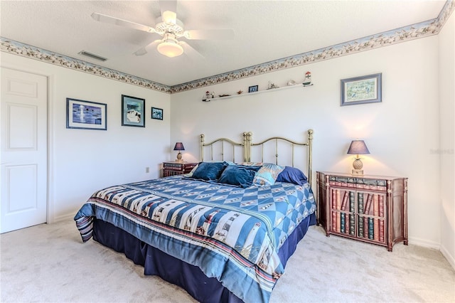 8132 Summersong Ct, Spring Hill, FL 34606 - bedroom with carpet, ceiling fan, a textured ceiling, and baseboards