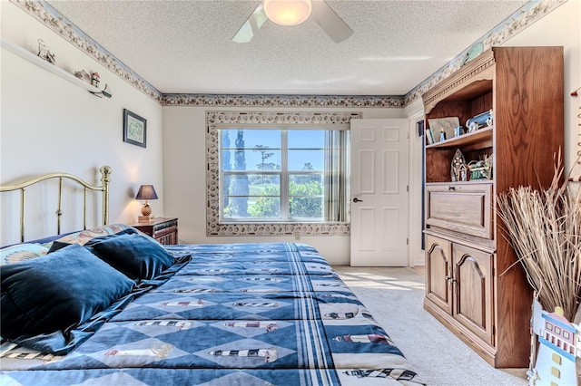 8132 Summersong Ct, Spring Hill, FL 34606 - bedroom featuring a textured ceiling, light colored carpet, and ceiling fan