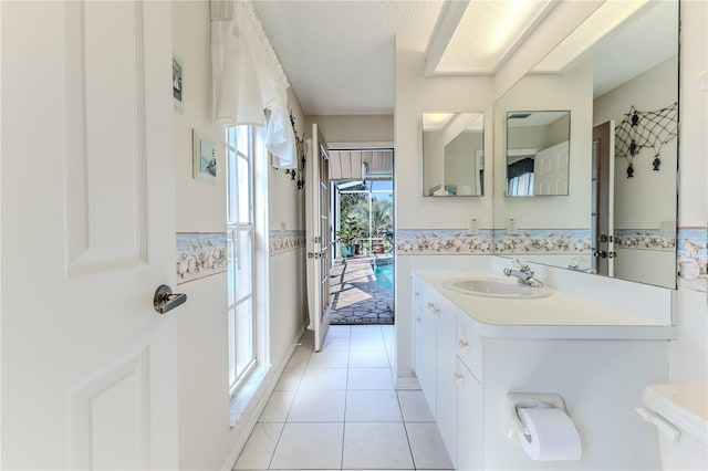 8132 Summersong Ct, Spring Hill, FL 34606 - bathroom featuring tile patterned floors and vanity