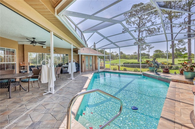 8132 Summersong Ct, Spring Hill, FL 34606 - swimming pool featuring a ceiling fan, a patio area, french doors, and view of golf course