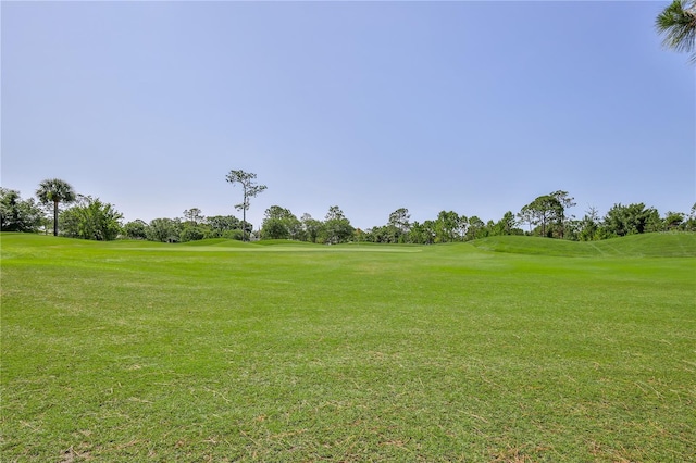 8132 Summersong Ct, Spring Hill, FL 34606 - view of property's community with golf course view and a yard