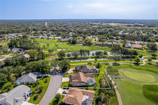 8132 Summersong Ct, Spring Hill, FL 34606 - aerial perspective of suburban area featuring property parcel outlined, a golf course, and a nearby body of water