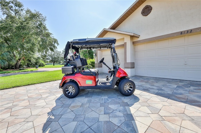 8132 Summersong Ct, Spring Hill, FL 34606 - view of side of home featuring stucco siding, decorative driveway, and a yard