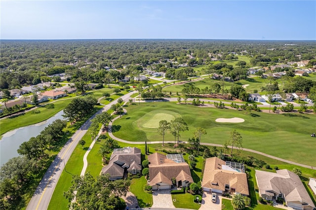 8132 Summersong Ct, Spring Hill, FL 34606 - aerial perspective of suburban area featuring a local golf course and a nearby body of water