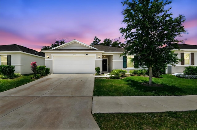 3886 Reflection Dock Dr, Seffner, FL 33584 - ranch-style house with a garage, a front yard, driveway, and stucco siding