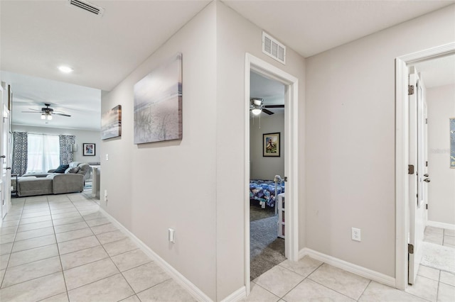 3886 Reflection Dock Dr, Seffner, FL 33584 - corridor with light tile patterned floors and baseboards