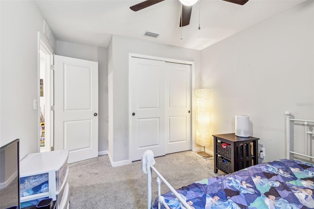 3886 Reflection Dock Dr, Seffner, FL 33584 - bedroom featuring carpet, a closet, ceiling fan, and baseboards