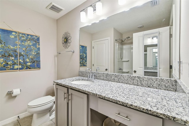 3886 Reflection Dock Dr, Seffner, FL 33584 - bathroom with toilet, vanity, tile patterned flooring, and baseboards
