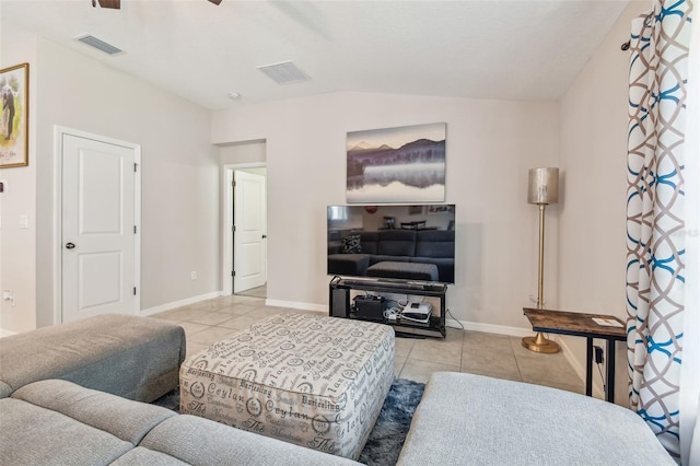 3886 Reflection Dock Dr, Seffner, FL 33584 - living room with tile patterned flooring, baseboards, ceiling fan, and lofted ceiling