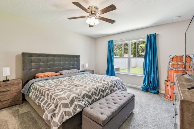 3886 Reflection Dock Dr, Seffner, FL 33584 - carpeted bedroom featuring baseboards, ceiling fan, and a textured ceiling