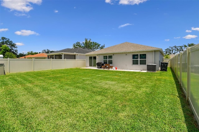3886 Reflection Dock Dr, Seffner, FL 33584 - rear view of house featuring stucco siding, a patio, and central AC