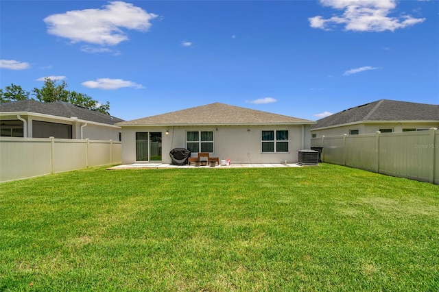 3886 Reflection Dock Dr, Seffner, FL 33584 - rear view of property featuring central AC, stucco siding, and a patio area