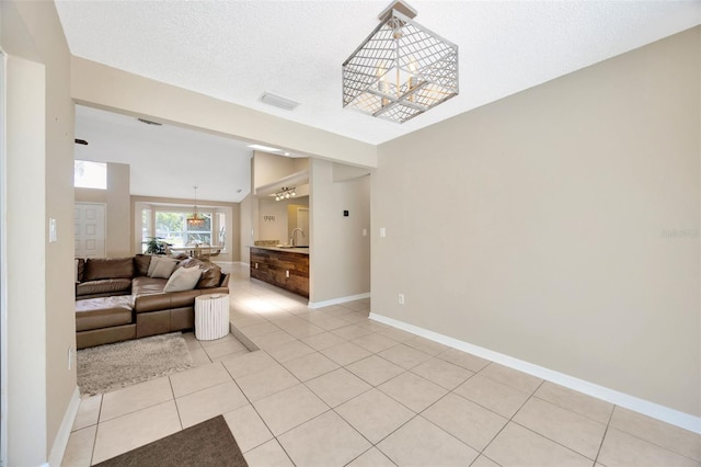 11291 Countrywood Ct, Spring Hill, FL 34609 - living room with light tile patterned floors and baseboards