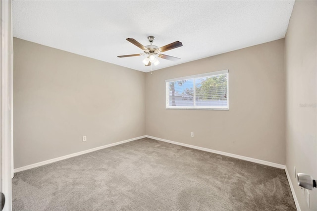 11291 Countrywood Ct, Spring Hill, FL 34609 - unfurnished room featuring carpet flooring, baseboards, and ceiling fan