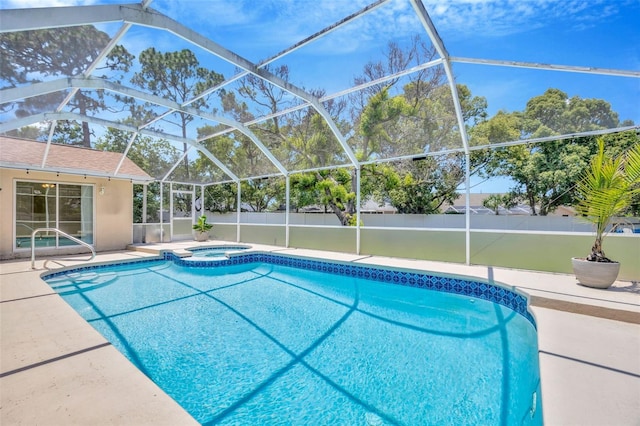 11291 Countrywood Ct, Spring Hill, FL 34609 - view of pool with a patio, glass enclosure, and a pool with connected hot tub