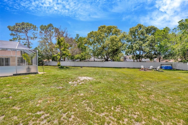 11291 Countrywood Ct, Spring Hill, FL 34609 - view of yard featuring a lanai