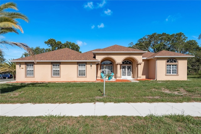 5423 Abagail Dr, Spring Hill, FL 34608 - mediterranean / spanish home with stucco siding and a front yard